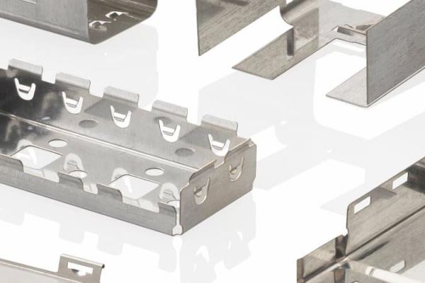 Stamped metal brackets and enclosures used for UAV component manufacturing.